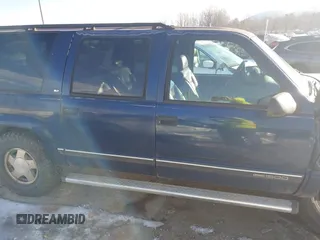 1998 GMC Suburban with VIN 1GKFK16R7WJ700525, listed as a IAAI auction lot 41305248 with 205,300 mi miles. Bid and sale history available at carsss.com. Image 13.