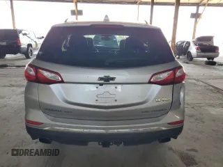 2019 Chevrolet Equinox Premier z VIN 3GNAXYEX3KS592663, wystawiony jako Copart lot #59635385 z przebiegiem 70 575 mil mil oraz Szkoda całkowita • Salvage title. Historia ofert i sprzedaży dostępna na DreamBid. Obrazek 6.