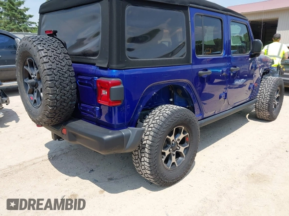 2018 Jeep Wrangler Unlimited Rubicon with VIN 1C4HJXFG8JW184793, listed as a IAAI auction lot 42429098 with 86,580 mi miles and . Bid and sale history available at DreamBid. Image 4.
