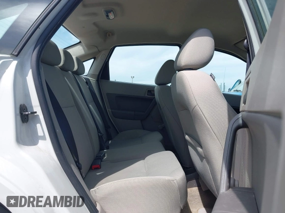 2011 Ford Focus S with VIN 1FAHP3EN7BW113051, listed as a IAAI auction lot 42002223 with 220,895 mi miles. Bid and sale history available at carsss.com. Image 8.