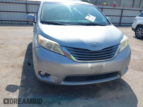 2011 Toyota Sienna XLE AAS with VIN 5TDYK3DC3BS007690, listed as a IAAI auction lot 42044640 with 253,359 mi miles. Bid and sale history available at carsss.com. Image 6.