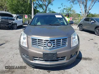2014 Cadillac SRX Luxury Collection z VIN 3GYFNEE3XES587233, wystawiony jako IAAI lot #41747779 z przebiegiem 116 571 mil mil oraz . Historia ofert i sprzedaży dostępna na DreamBid. Obrazek 12.