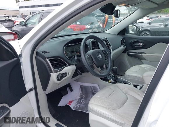 2019 Jeep Cherokee Limited z VIN 1C4PJLDB5KD332729, wystawiony jako IAAI lot #42407891 z przebiegiem 53 170 mil mil oraz . Historia ofert i sprzedaży dostępna na DreamBid. Obrazek 19.