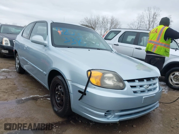 2003 Hyundai Accent GL with VIN KMHCG35C23U264360, listed as a IAAI auction lot 42033316 with 100,991 mi miles. Bid and sale history available at carsss.com. Image 1.