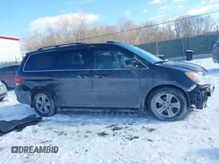 2008 Honda Odyssey Touring with VIN 5FNRL38948B029193, listed as a IAAI auction lot 41618424 with 219,964 mi miles. Bid and sale history available at carsss.com. Image 14.