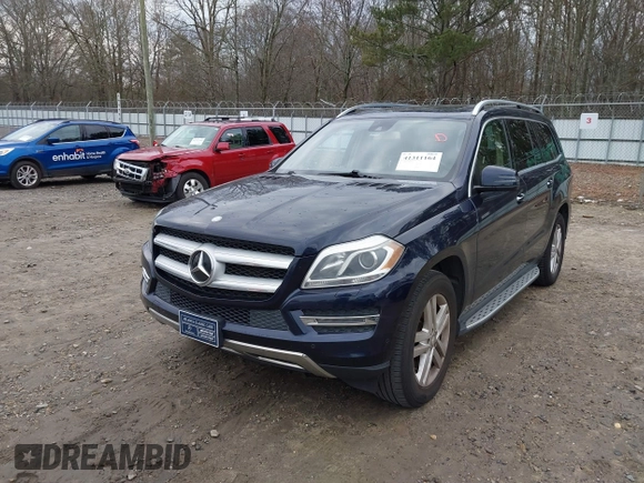 2015 Mercedes-Benz GL-Class GL 450 with VIN 4JGDF6EE9FA513009, listed as a IAAI auction lot 41311164 with 121,185 mi miles. Bid and sale history available at carsss.com. Image 2.