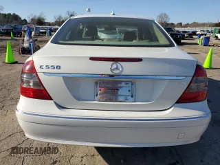 2007 Mercedes-Benz E 550 with VIN WDBUF72X37B021084, listed as a Copart auction lot 48695235 with 119,538 mi miles and Salvage Title. Bid and sale history available at DreamBid. Image 6.