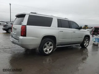 2015 Chevrolet Suburban LTZ with VIN 1GNSCKKCXFR587516, listed as a Copart auction lot 50877665 with 193,618 mi miles and Salvage Title. Bid and sale history available at carsss.com. Image 3.