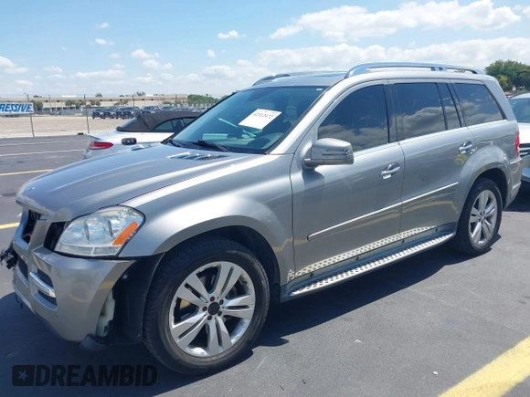 2012 Mercedes-Benz GL 450 z VIN 4JGBF7BE1CA800793, wystawiony jako IAAI lot #42312472 z przebiegiem 155 847 mil mil oraz . Historia ofert i sprzedaży dostępna na DreamBid. Obrazek 2.