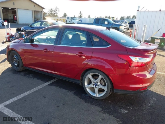 2014 Ford Focus Titanium with VIN 1FADP3J23EL137525, listed as a IAAI auction lot 41562684 with 127,104 mi miles. Bid and sale history available at carsss.com. Image 3.
