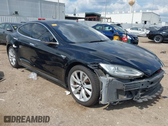 2014 Tesla Model S 60 z VIN 5YJSA1H1XEFP44397, wystawiony jako IAAI lot #42140917 z przebiegiem 136 515 mil mil oraz . Historia ofert i sprzedaży dostępna na DreamBid. Obrazek 1.