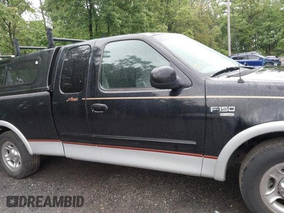 2000 Ford F-150 XL z VIN 1FTRX17L2YNB60131, wystawiony jako IAAI lot #42295537 z przebiegiem 216 638 mil mil oraz . Historia ofert i sprzedaży dostępna na DreamBid. Obrazek 13.