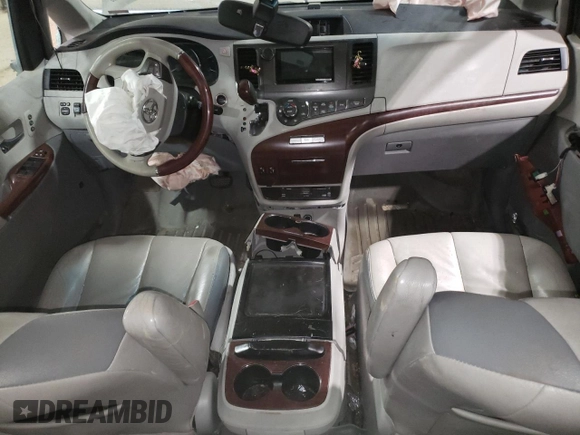 2012 Toyota Sienna XLE с VIN 5TDDK3DC3CS040365, выставлен на аукционе Copart как лот 63818815 с пробегом Не указан миль и Списание • Salvage title. История ставок и продаж доступна на DreamBid. Изображение 8.