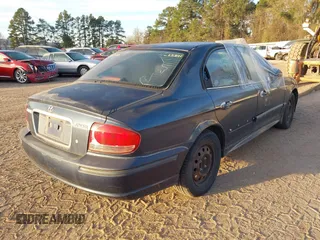 2003 Hyundai Sonata with VIN KMHWF25S93A887316, listed as a IAAI auction lot 41714217 with 299,890 mi miles. Bid and sale history available at carsss.com. Image 4.