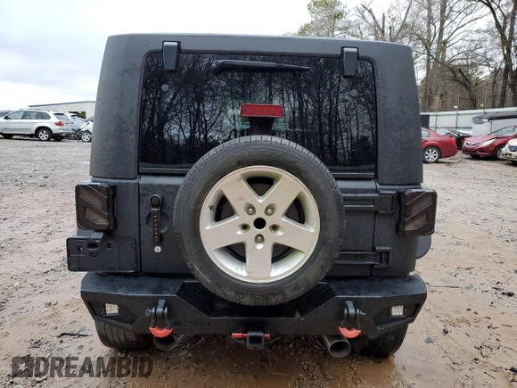 2007 Jeep Wrangler Unlimited Sahara with VIN 1J4GB59157L205933, listed as a Copart auction lot 49092795 with 364,193 mi miles and Salvage title. Bid and sale history available at DreamBid. Image 6.