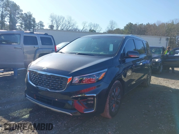 2020 Kia Sedona EX with VIN KNDMC5C19L6617750, listed as a IAAI auction lot 41772439 with 59,635 mi miles. Bid and sale history available at carsss.com. Image 2.