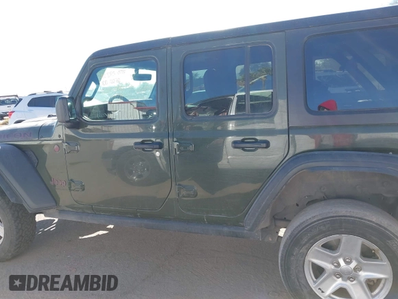 2023 Jeep Wrangler Rubicon with VIN 1C4JJXFG8PW518234, listed as a IAAI auction lot 40998757 with Not Provided miles and . Bid and sale history available at DreamBid. Image 14.