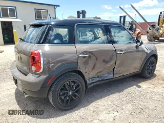 2012 MINI Countryman with VIN WMWZB3C59CWM04522, listed as a Copart auction lot 56605865 with 33,186 mi miles and Salvage title. Bid and sale history available at DreamBid. Image 3.
