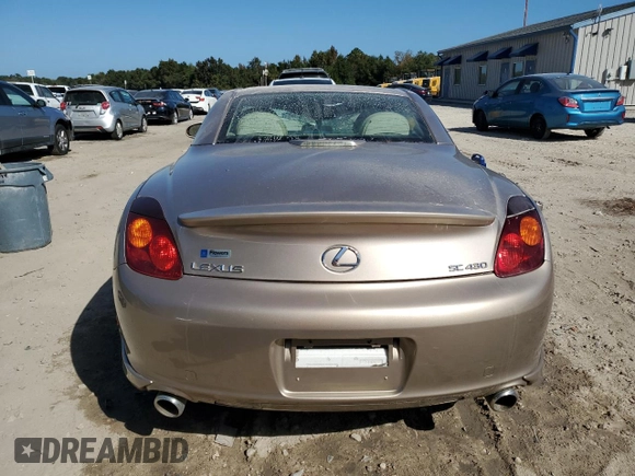2002 Lexus SC 430 with VIN JTHFN48Y220006106, listed as a Copart auction lot 76703744 with 114,122 mi miles and Salvage Title. Bid and sale history available at DreamBid. Image 6.