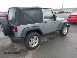 2015 Jeep Wrangler Sport with VIN 1C4AJWAG6FL501160, listed as a IAAI auction lot 41941661 with 134,842 mi miles. Bid and sale history available at carsss.com. Image 4.