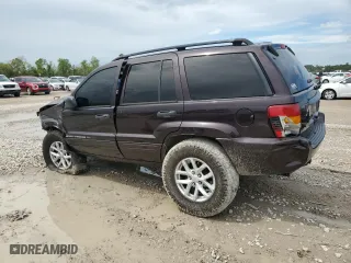 2004 Jeep Grand Cherokee Laredo with VIN 1J4GX48S44C150571, listed as a Copart auction lot 51013675 with 260,986 mi miles and Salvage Title. Bid and sale history available at carsss.com. Image 2.