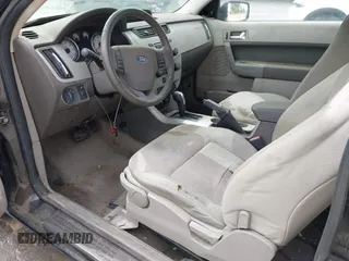 2008 Ford Focus SE with VIN 1FAHP33N38W107114, listed as a IAAI auction lot 42076432 with 124,487 mi miles. Bid and sale history available at carsss.com. Image 5.