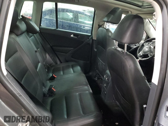 2013 Volkswagen Tiguan SE z VIN WVGBV3AX4DW055332, wystawiony jako Copart lot #42297805 z przebiegiem 109 606 mil mil oraz Szkoda całkowita • Salvage title. Historia ofert i sprzedaży dostępna na DreamBid. Obrazek 11.