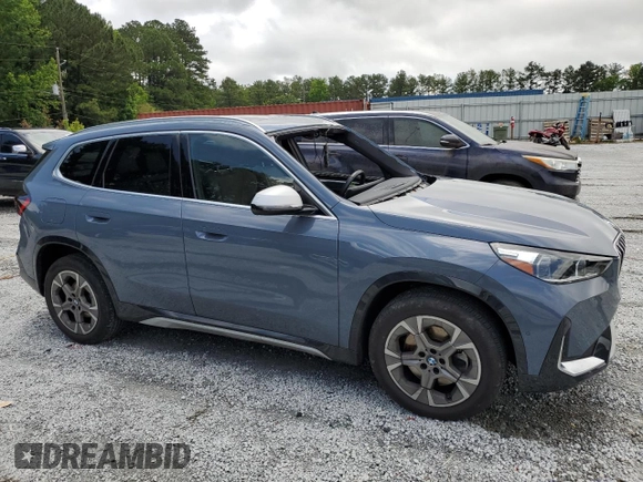 2023 BMW X1 xDrive28i with VIN WBX73EF08P5W51452, listed as a Copart auction lot 58420175 with 30,404 mi miles and Salvage title. Bid and sale history available at DreamBid. Image 4.