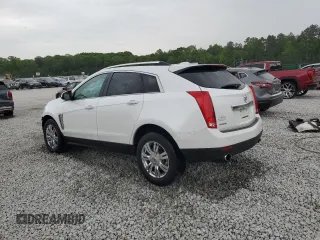 2015 Cadillac SRX Luxury Collection with VIN 3GYFNBE32FS581541, listed as a Copart auction lot 54134415 with 154,372 mi miles and Salvage Title. Bid and sale history available at DreamBid. Image 2.