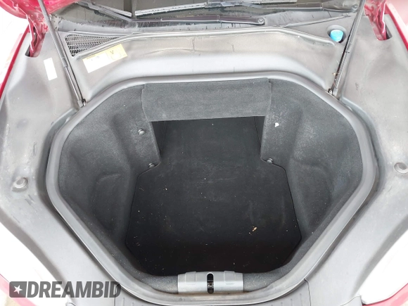 2013 Tesla Model S with VIN 5YJSA1CN7DFP26996, listed as a IAAI auction lot 42244540 with 128,160 mi miles and . Bid and sale history available at DreamBid. Image 10.