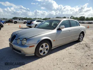 2000 Jaguar S-Type V6 z VIN SAJDA01CXYFL10576, wystawiony jako Copart lot #59732474 z przebiegiem Nie podano mil oraz Szkoda całkowita • Salvage title. Historia ofert i sprzedaży dostępna na DreamBid. Obrazek 1.