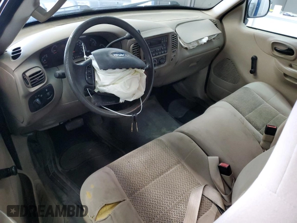 2003 Ford F-150 XL with VIN 1FTRF17293NA60031, listed as a Copart auction lot 55433885 with 186,557 mi miles and Salvage title. Bid and sale history available at DreamBid. Image 8.