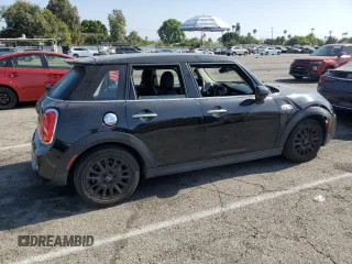2021 MINI Hardtop 4 Door Cooper S с VIN WMWXU9C06M2N01629, выставлен на аукционе Copart как лот 65398605 с пробегом 74 356 миль миль и Списание • Salvage title. История ставок и продаж доступна на DreamBid. Изображение 3.