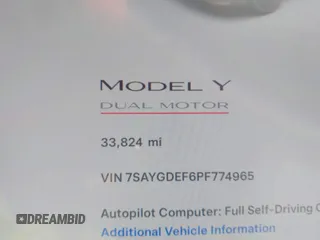 2023 Tesla Model Y Performance z VIN 7SAYGDEF6PF774965, wystawiony jako IAAI lot #41655550 z przebiegiem 33 824 mil mil oraz . Historia ofert i sprzedaży dostępna na DreamBid. Obrazek 15.