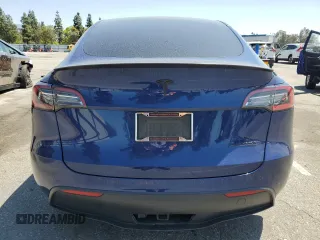 2021 Tesla Model Y Performance z VIN 5YJYGDEF0MF157795, wystawiony jako Copart lot #57163245 z przebiegiem 62 598 mil mil oraz Szkoda całkowita • Salvage title. Historia ofert i sprzedaży dostępna na DreamBid. Obrazek 6.