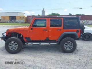 2015 Jeep Wrangler Unlimited Rubicon z VIN 1C4BJWFG4FL598033, wystawiony jako IAAI lot #42435523 z przebiegiem 134 202 mil mil oraz . Historia ofert i sprzedaży dostępna na DreamBid. Obrazek 14.