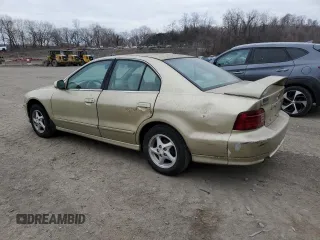 2001 Mitsubishi Galant ES z VIN 4A3AA46G51E020677, wystawiony jako Copart lot #87795655 z przebiegiem 61 145 mil mil oraz Tytuł czysty. Historia ofert i sprzedaży dostępna na DreamBid. Obrazek 2.