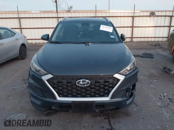 2019 Hyundai Tucson Sport with VIN KM8J33AL7KU901296, listed as a IAAI auction lot 41132884 with 76,948 mi miles. Bid and sale history available at carsss.com. Image 12.