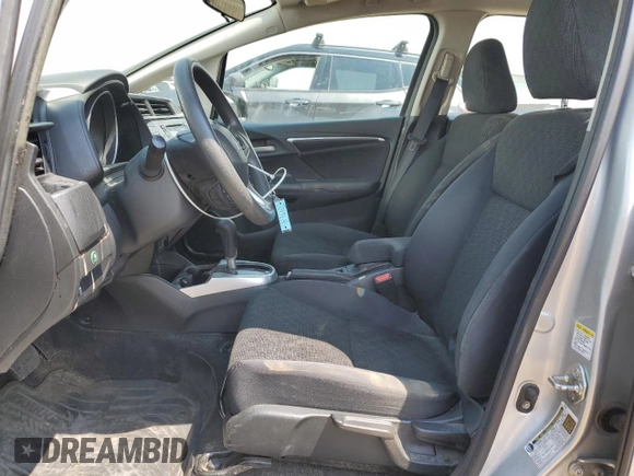 2015 Honda Fit LX with VIN 3HGGK5H59FM709104, listed as a Copart auction lot 63569065 with 101,859 mi miles and Salvage title. Bid and sale history available at DreamBid. Image 7.