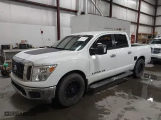 2018 Nissan Titan SV with VIN 1N6AA1E63JN539220, listed as a IAAI auction lot 41487109 with 122,144 mi miles. Bid and sale history available at carsss.com. Image 2.