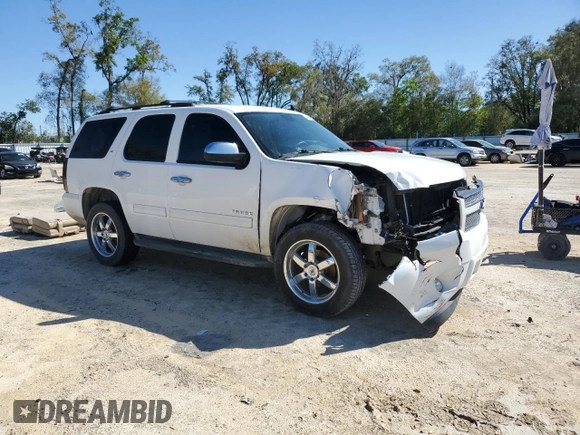 2014 Chevrolet Tahoe LT with VIN 1GNSCBE08ER192587, listed as a Copart auction lot 49216975 with 178,595 mi miles and Salvage title. Bid and sale history available at DreamBid. Image 4.