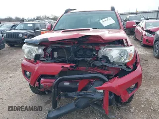 2015 Toyota Tacoma with VIN 3TMLU4EN8FM189953, listed as a IAAI auction lot 41584110 with 126,833 mi miles and . Bid and sale history available at DreamBid. Image 13.