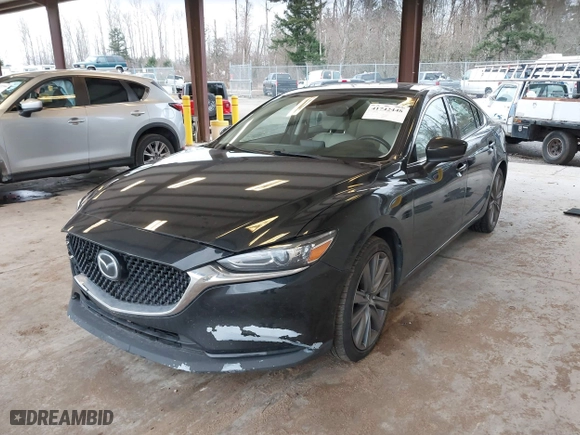 2021 Mazda Mazda6 Touring with VIN JM1GL1VM2M1604415, listed as a IAAI auction lot 41742448 with 103,776 mi miles. Bid and sale history available at carsss.com. Image 17.