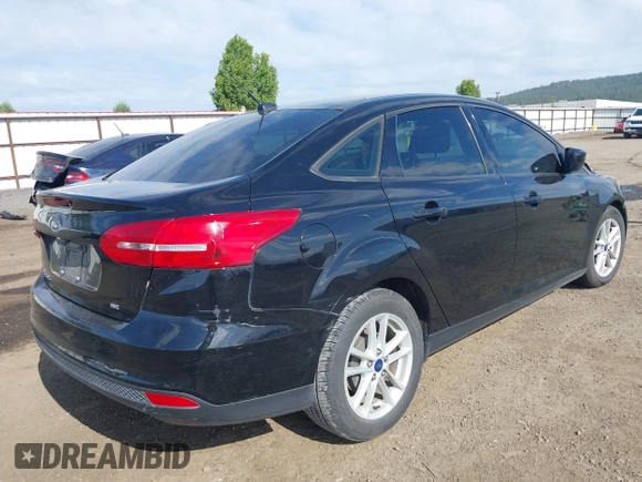 2018 Ford Focus SE z VIN 1FADP3F20JL288437, wystawiony jako IAAI lot #42278885 z przebiegiem 132 504 mil mil oraz . Historia ofert i sprzedaży dostępna na DreamBid. Obrazek 4.