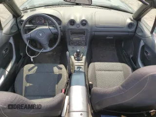 2000 Mazda MX-5 Miata with VIN JM1NB3533Y0151883, listed as a Copart auction lot 64423925 with 180,275 mi miles and Salvage title. Bid and sale history available at DreamBid. Image 8.