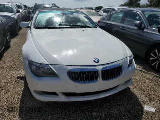 2009 BMW 6 Series 650i with VIN WBAEB53589CX64448, listed as a Copart auction lot 73867784 with 80,795 mi miles and Salvage Title. Bid and sale history available at carsss.com. Image 5.