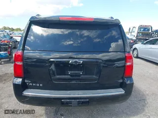 2015 Chevrolet Tahoe LTZ with VIN 1GNSCCKC7FR746028, listed as a IAAI auction lot 41674775 with 198,067 mi miles. Bid and sale history available at carsss.com. Image 17.