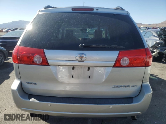 2010 Toyota Sienna XLE with VIN 5TDYK4CC3AS324570, listed as a Copart auction lot 60474005 with 259,128 mi miles and Salvage title. Bid and sale history available at DreamBid. Image 6.