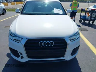 2016 Audi Q3 Premium Plus z VIN WA1BFCFS0GR014028, wystawiony jako IAAI lot #42274987 z przebiegiem 64 667 mil mil oraz . Historia ofert i sprzedaży dostępna na DreamBid. Obrazek 12.