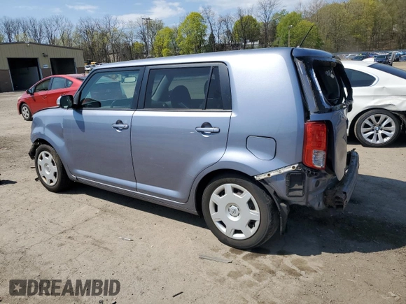 2012 Scion xB with VIN JTLZE4FE7CJ030408, listed as a Copart auction lot 54153195 with 198,649 mi miles and Salvage Title. Bid and sale history available at DreamBid. Image 2.